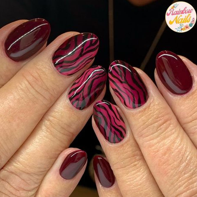 Zebra Print Burgundy Nails