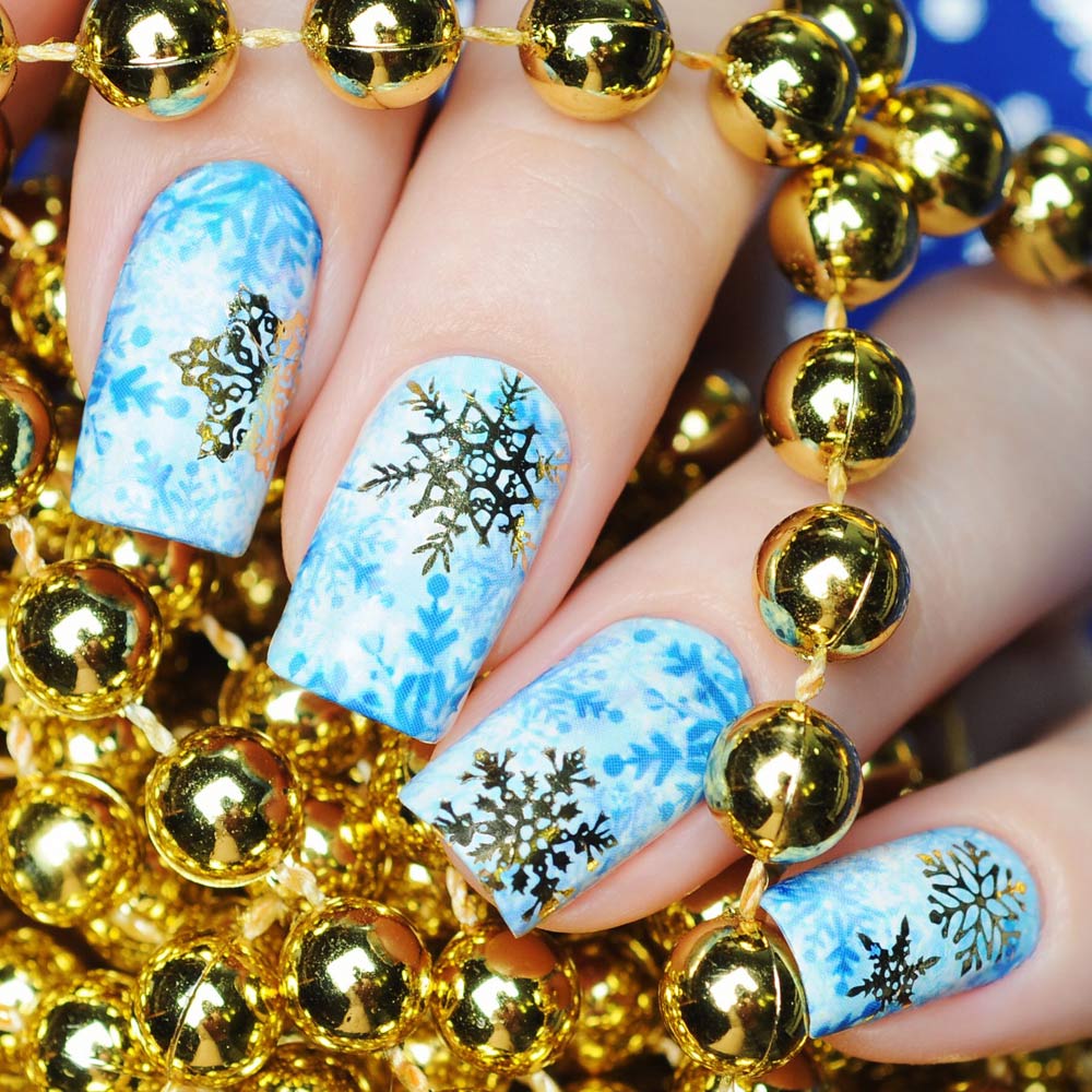 Bright Christmas Nails with Gold Snowflakes