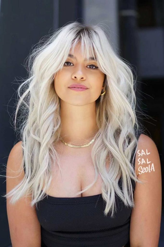 Layered Ice-Blonde Hair with Bangs
