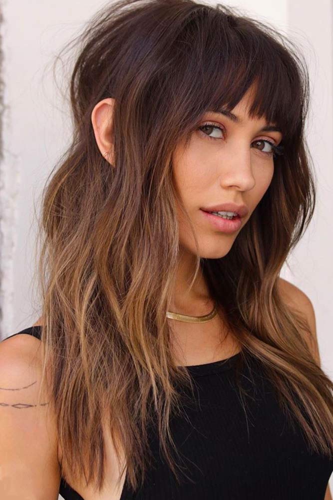 Shaggy Layered Hairstyle With Choppy Bangs