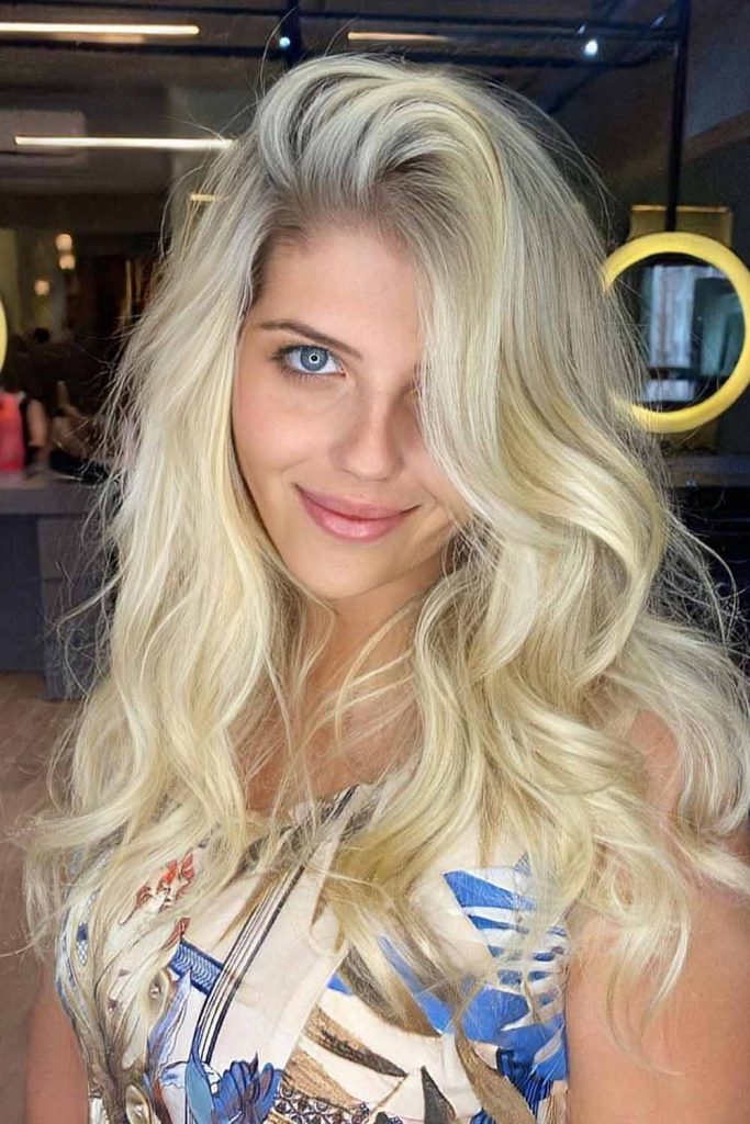 Voluminous Side Bangs and Long Layered Hair
