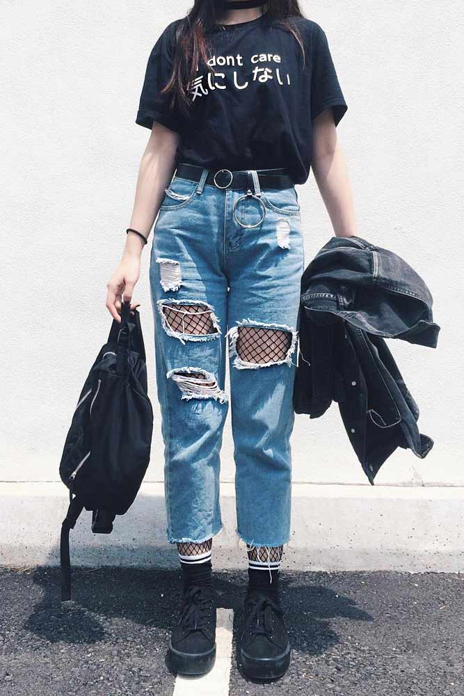 Ripped Jeans With Black Fishnet Tights Underneath #fishnettights #rippedjeans
