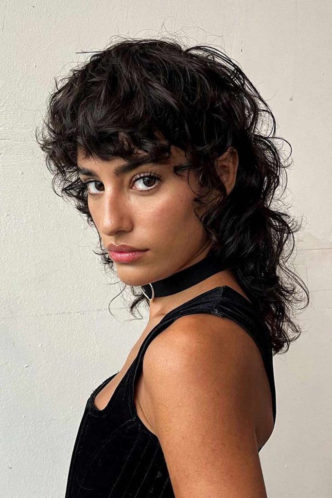 Curly Wolf Cut with Playful Bangs