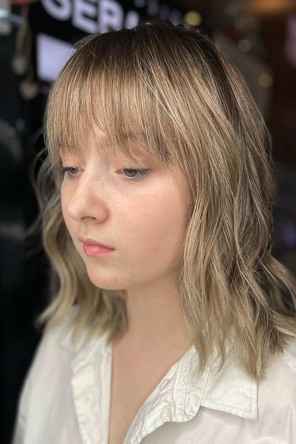 Medium Length Hairstyles for Thin Hair with Wispy Bangs