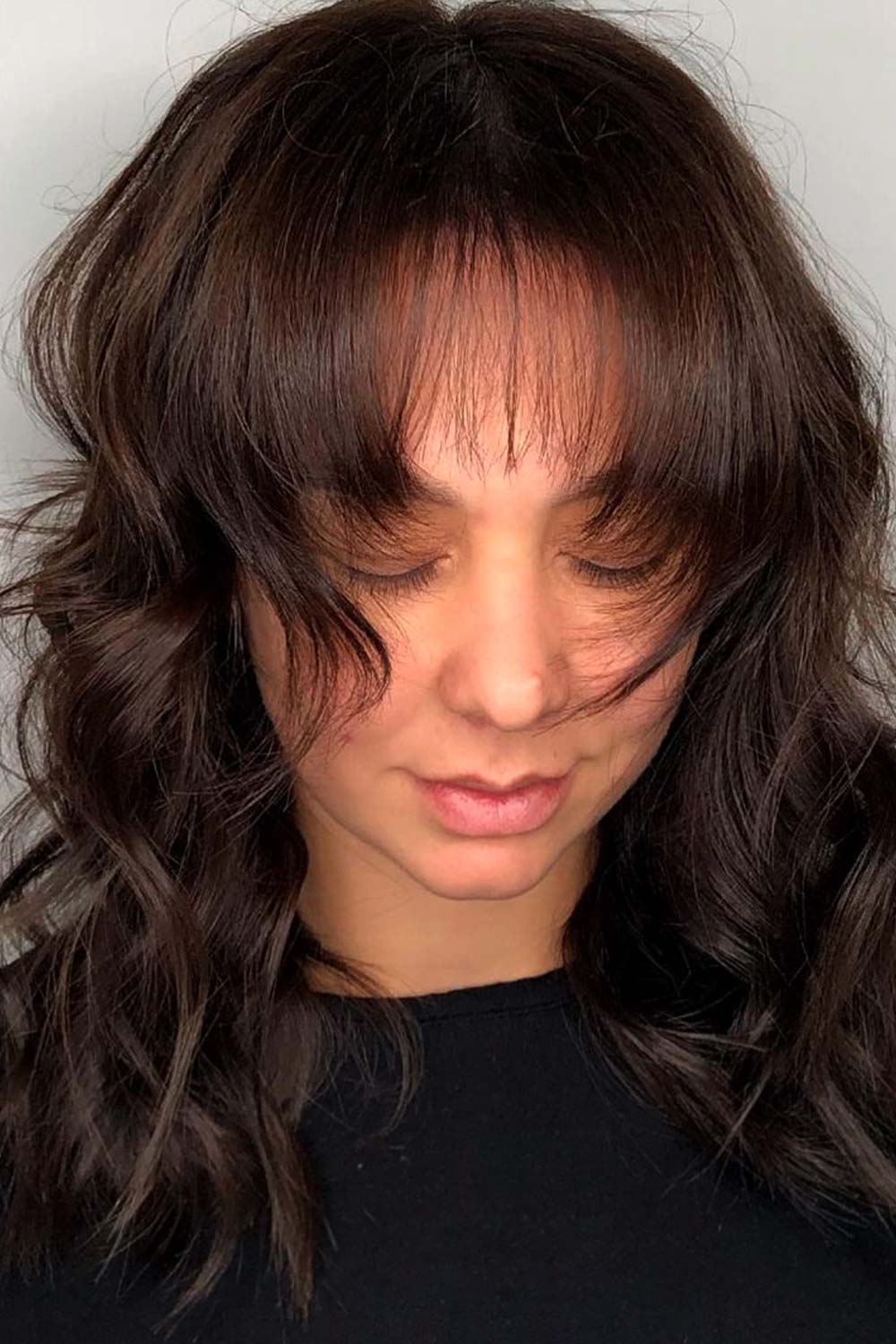 Medium Shaggy Layers with Wispy Bangs