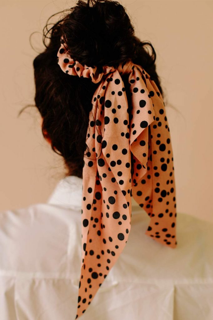 Updo Hairstyle With Scarf Accessory