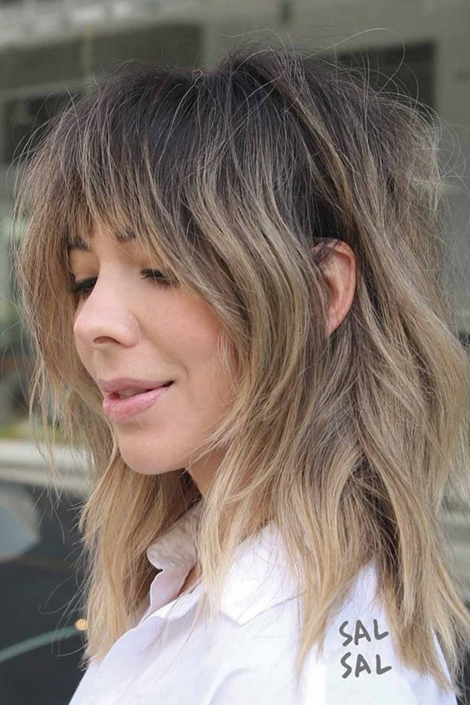 Dirty Blode Layered Haircut with Bangs