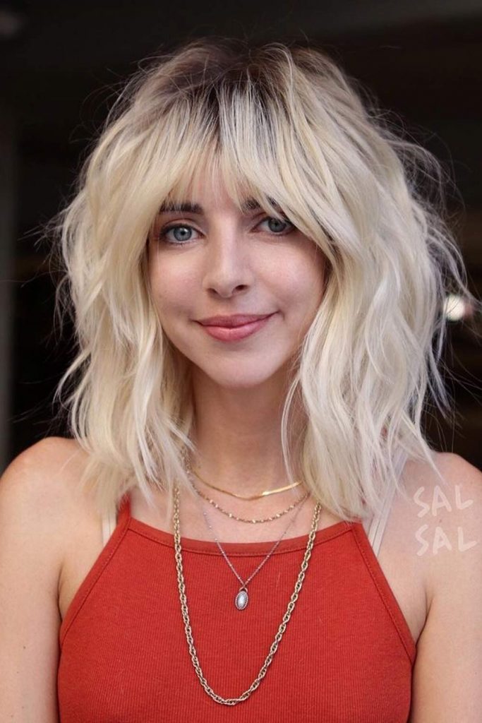 Layered Haircut for Medium Blonde Hair with Dark Roots