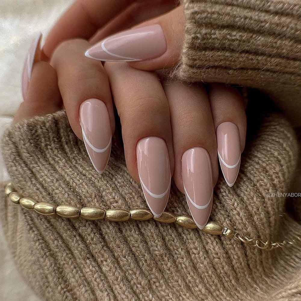Nude Stiletto Nails with French Design