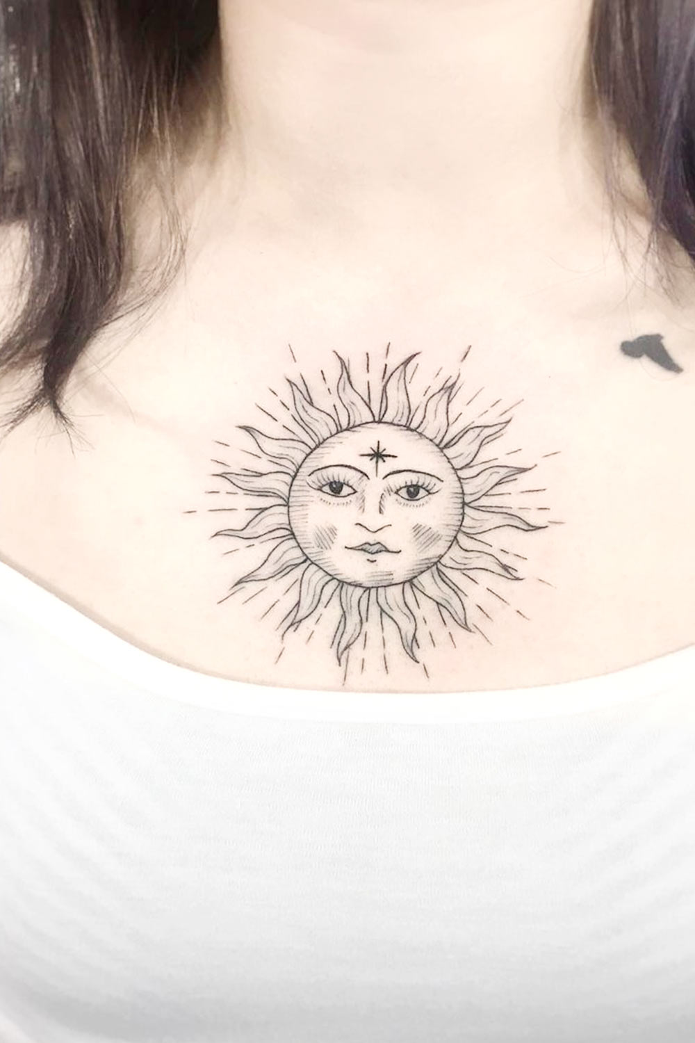 Sun Tattoo on Chest