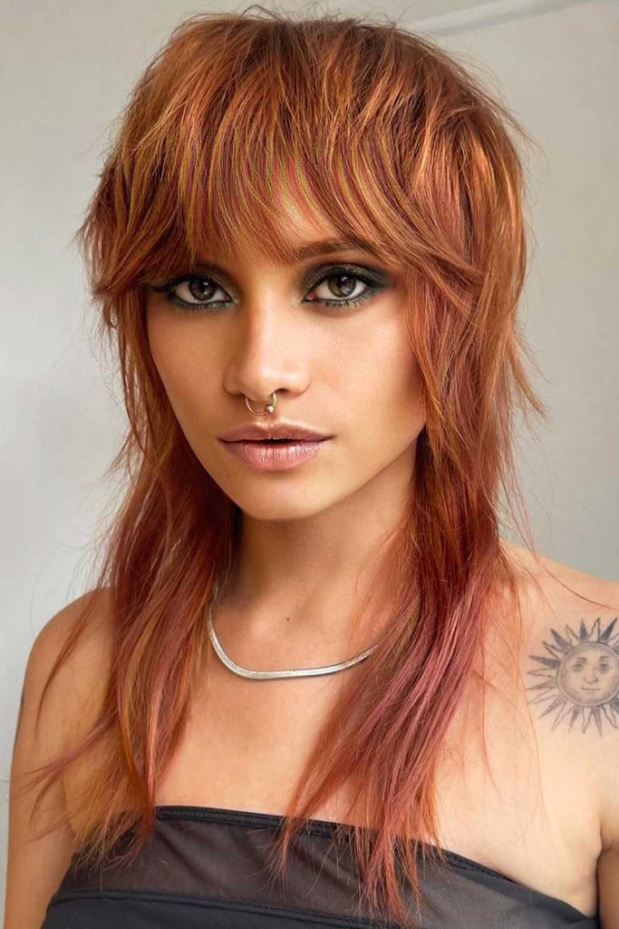 Edgy Wolf Cut with Heavy Bangs #wolfcuthairstyles #wolfcuthair #wolfcut