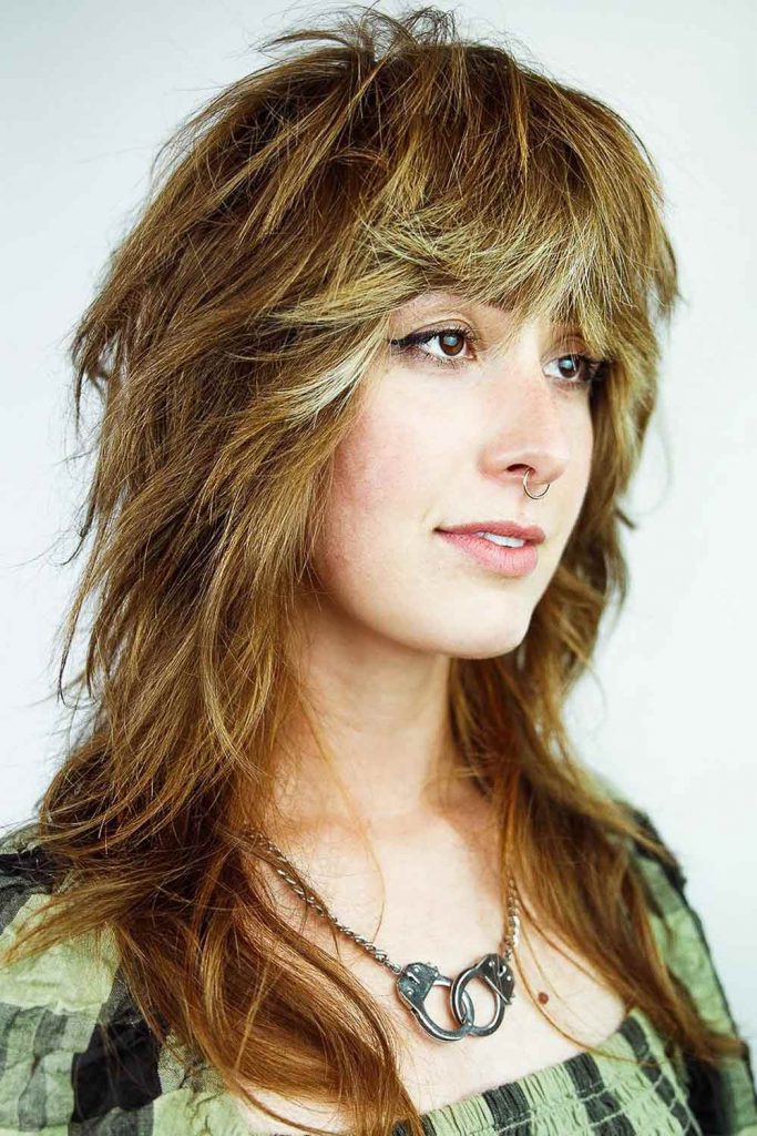 The ’70s Inspired Wolf Cut with Curtain Bangs #wolfcuthairstyles #wolfcuthair #wolfcut